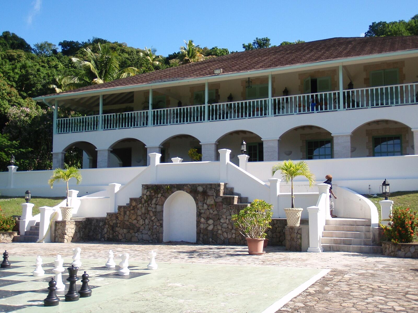 Illustrative accommodation photography for a fictional saint-lucia stay — illustrative style for Sand & Sea Family House