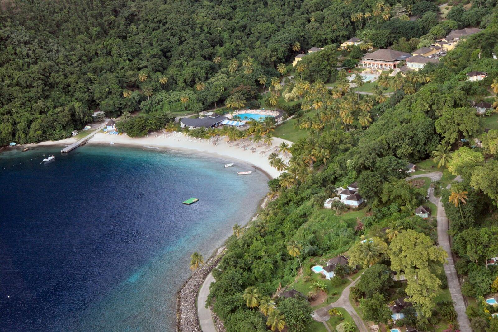 Illustrative accommodation photography for a fictional saint-lucia stay — illustrative style for Tropical Haven Estate