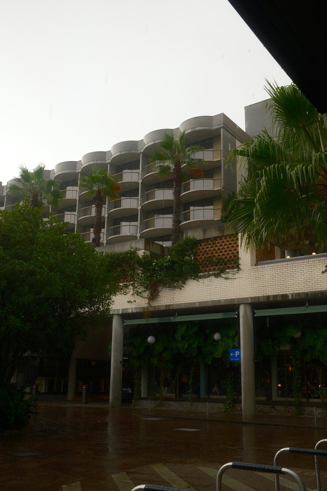 A building with balconies and palm trees. — illustrative property style — illustrative style for Daintree Canopy Lodge