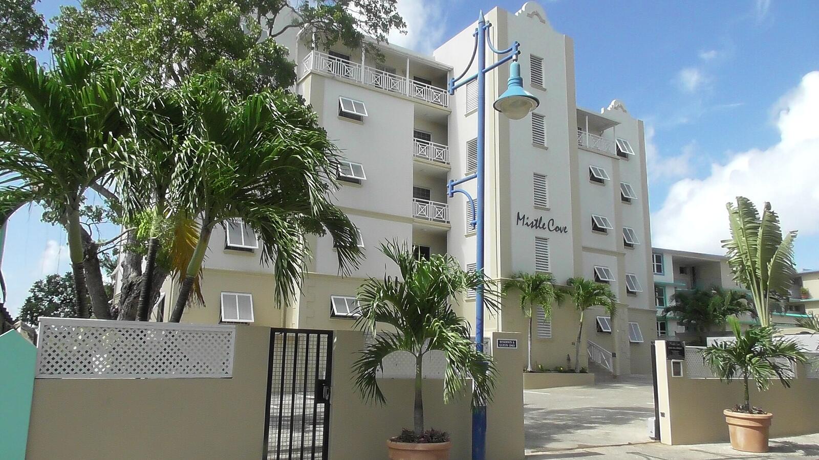 Illustrative accommodation photography for a fictional barbados stay — illustrative style for Pelican Harbour Rooms