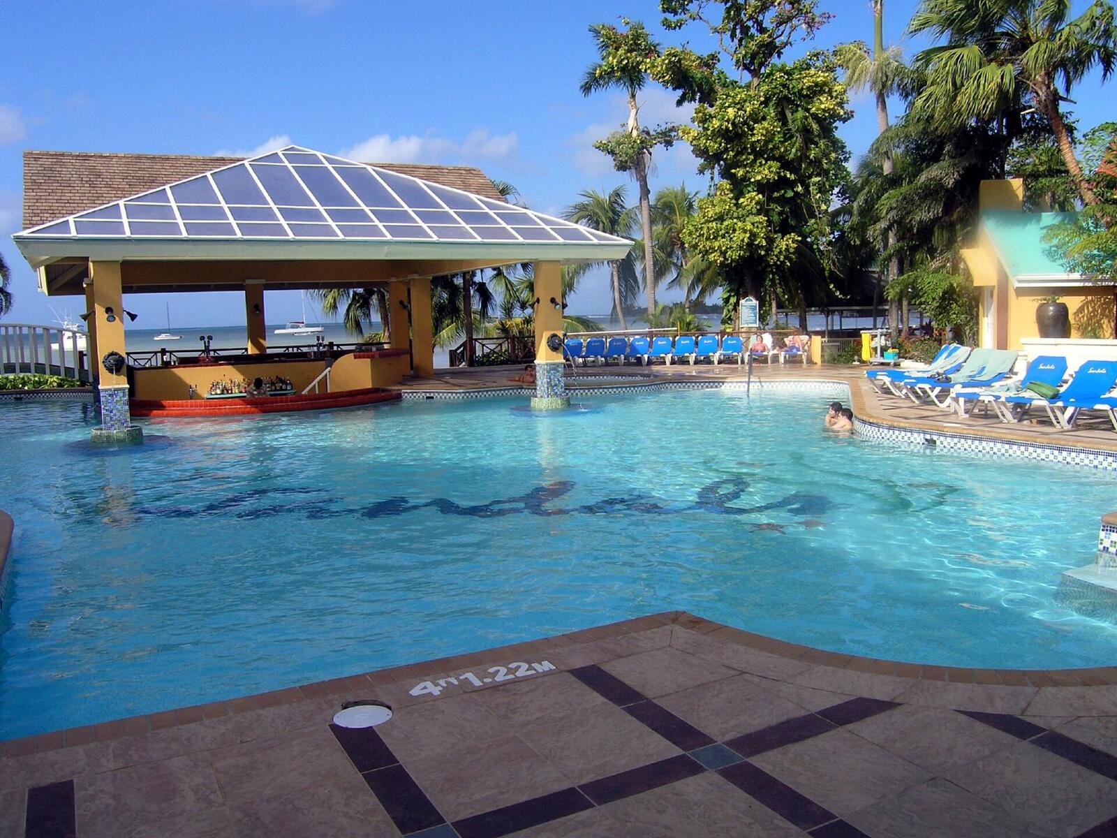 Illustrative accommodation photography for a fictional jamaica stay — illustrative style for Fern Valley Nature Retreat