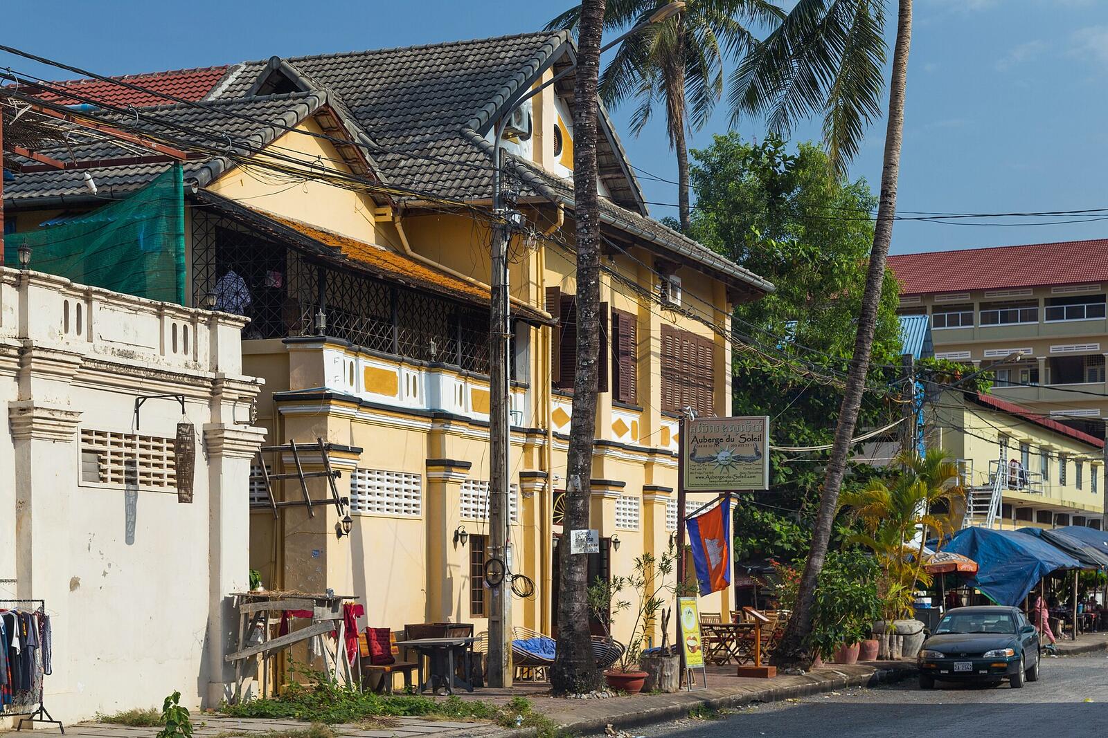 Illustrative accommodation photography for a fictional cambodia stay — illustrative style for Kampot Riverbend House