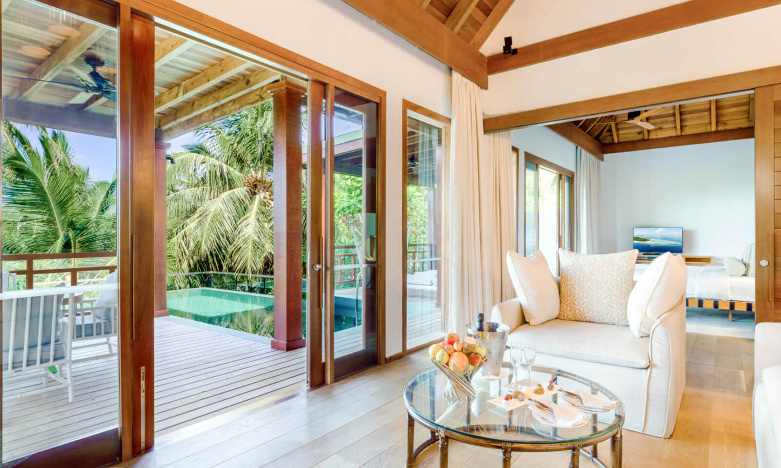 Illustrative accommodation photography for a fictional maldives stay — illustrative style for Moon Reef Family Island