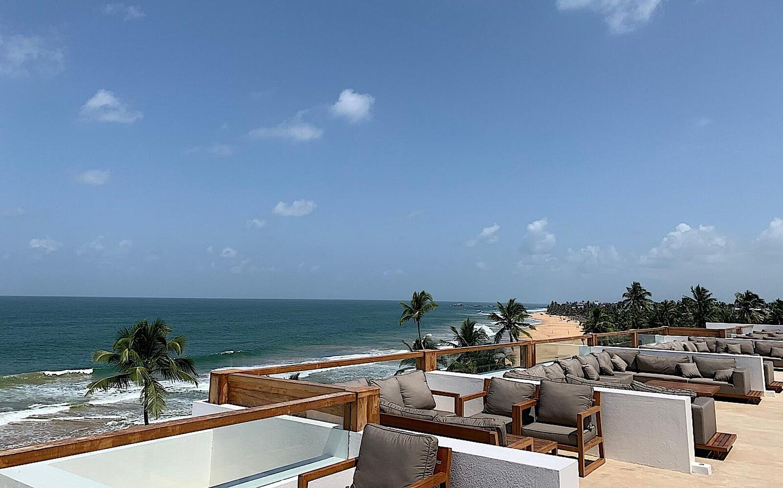 Illustrative accommodation photography for a fictional sri-lanka stay — illustrative style for Knuckles Fern Lodge