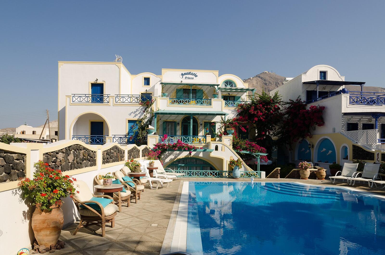 Illustrative accommodation photography for a fictional greece stay — illustrative style for Hydra Harbour House