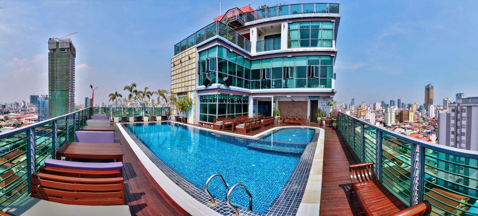 Rooftop pool and modern accommodation architecture in Phnom Penh — illustrative property style — illustrative style for Riverfront Courtyard