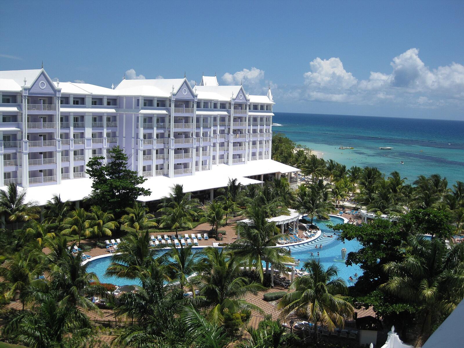 Illustrative accommodation photography for a fictional jamaica stay — illustrative style for Rosewater Bay Villas