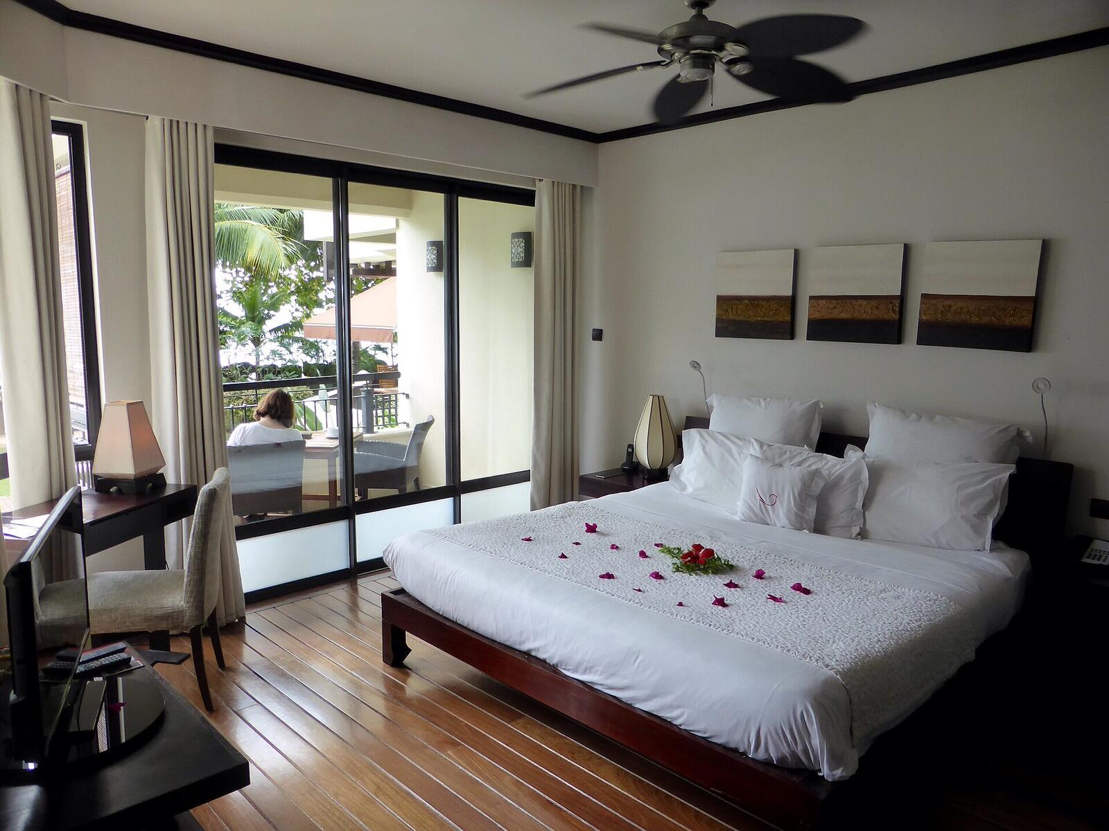 Illustrative accommodation photography for a fictional mauritius stay — illustrative style for Blue Heron Family Resort