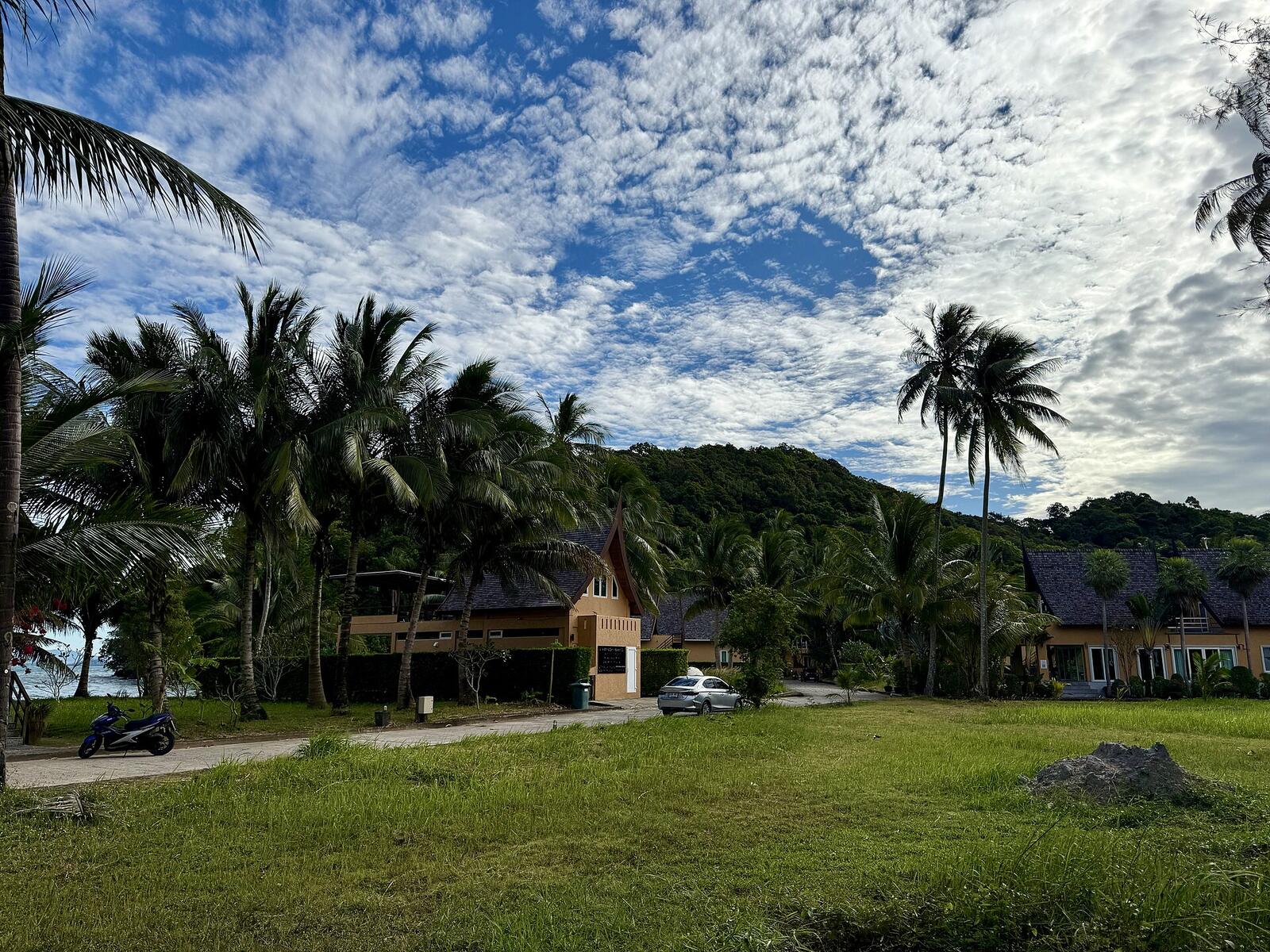 Illustrative accommodation photography for a fictional thailand stay — illustrative style for Siam Garden Courtyard