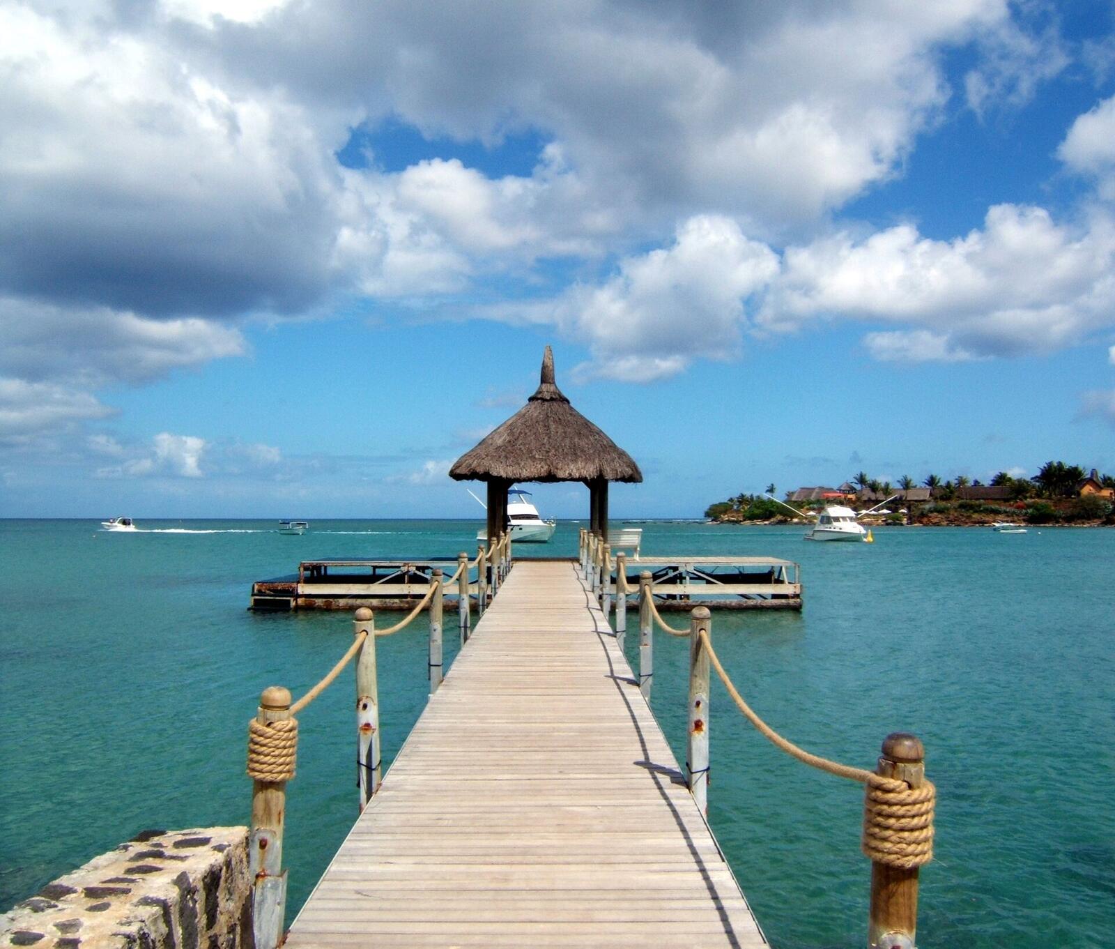 Illustrative accommodation photography for a fictional mauritius stay — illustrative style for Tamarind Lagoon Villas