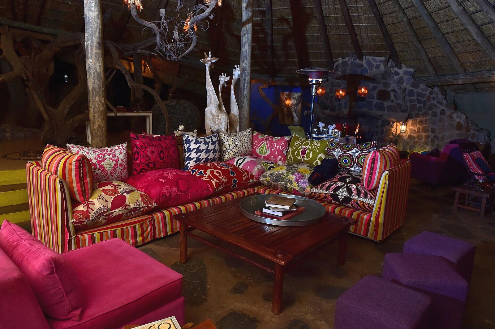 Illustrative accommodation photography for a fictional south-africa stay — illustrative style for Hoedspruit Marula Camp