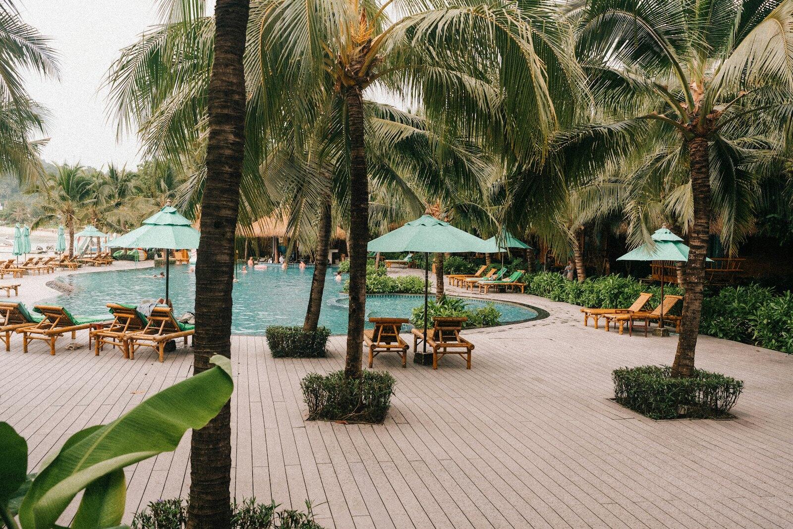 A tropical resort offers a pool and palm trees — illustrative property style — illustrative style for Lanna Garden Retreat