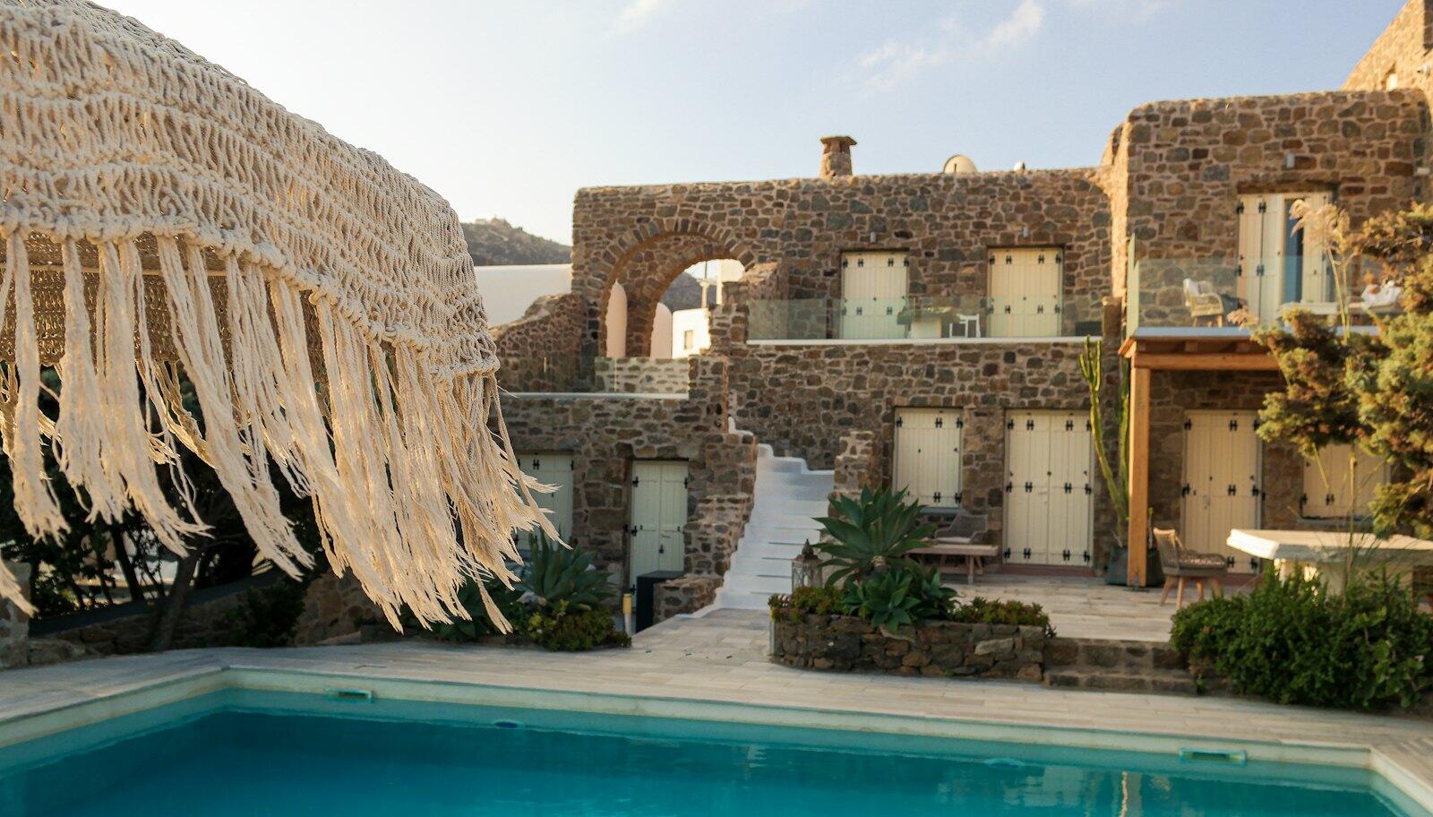 a house with a pool in front of it — illustrative property style — illustrative style for Chania Courtyard House
