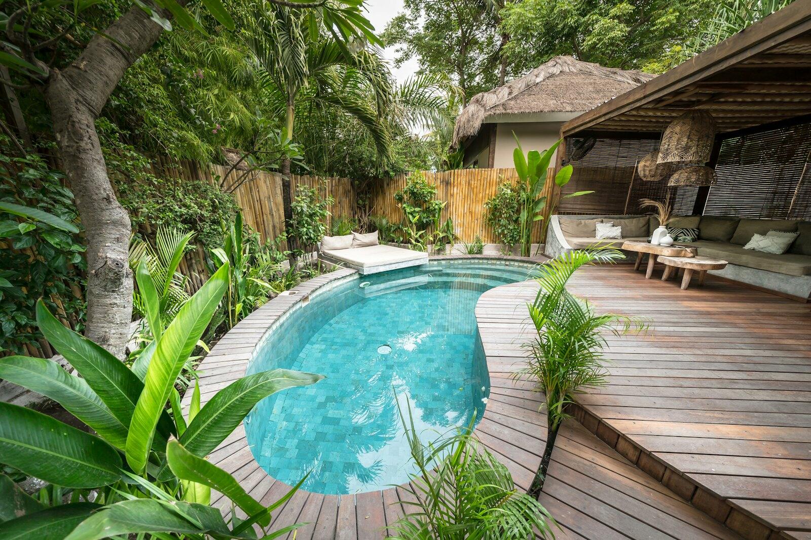 Tropical villa with a private pool and outdoor seating — illustrative property style — illustrative style for The Port Louis Terrace