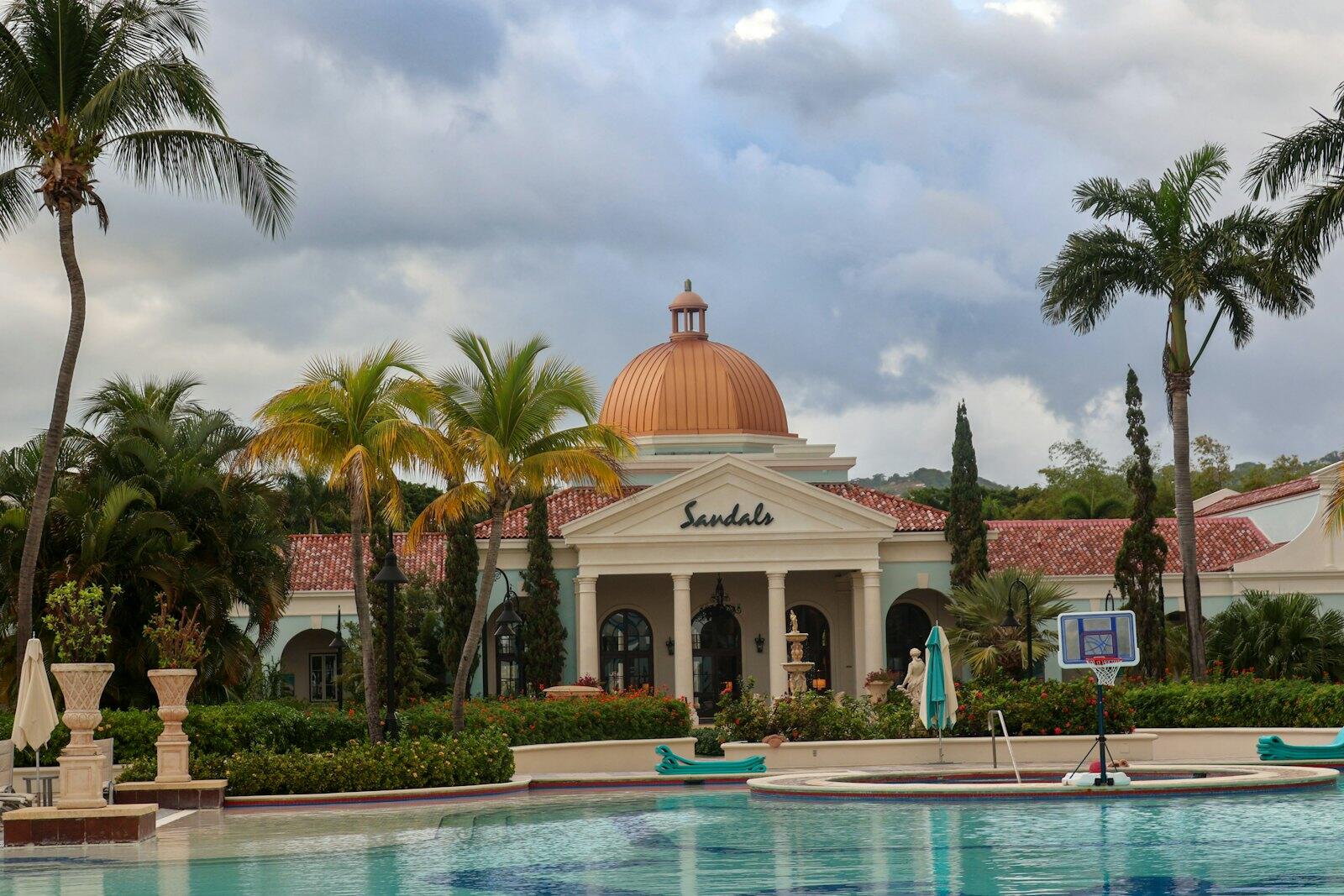 A large building with a dome on top of it — illustrative property style — illustrative style for Hibiscus Bay