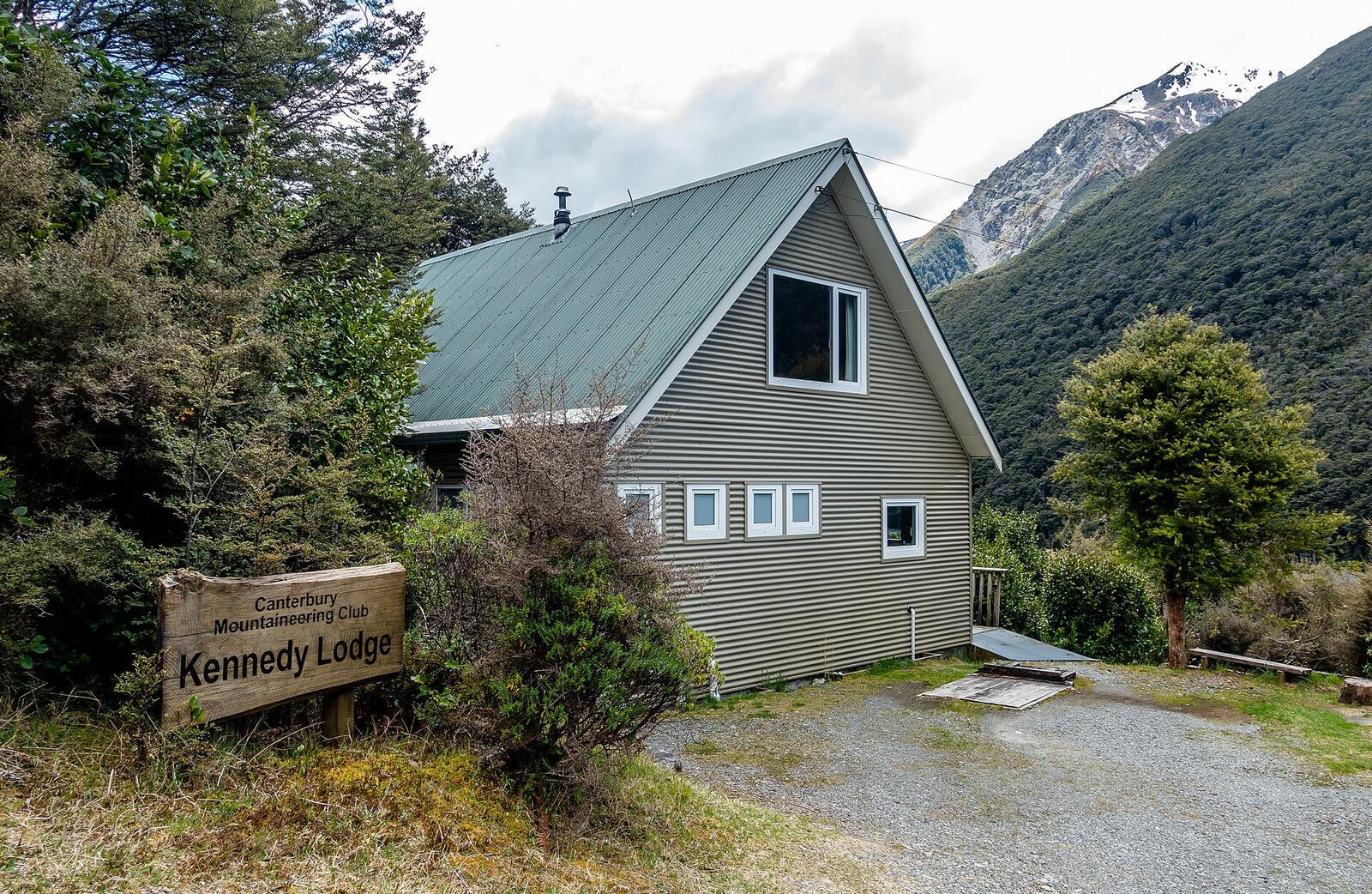 Illustrative accommodation photography for a fictional new-zealand stay — illustrative style for Kaikoura Ocean Retreat