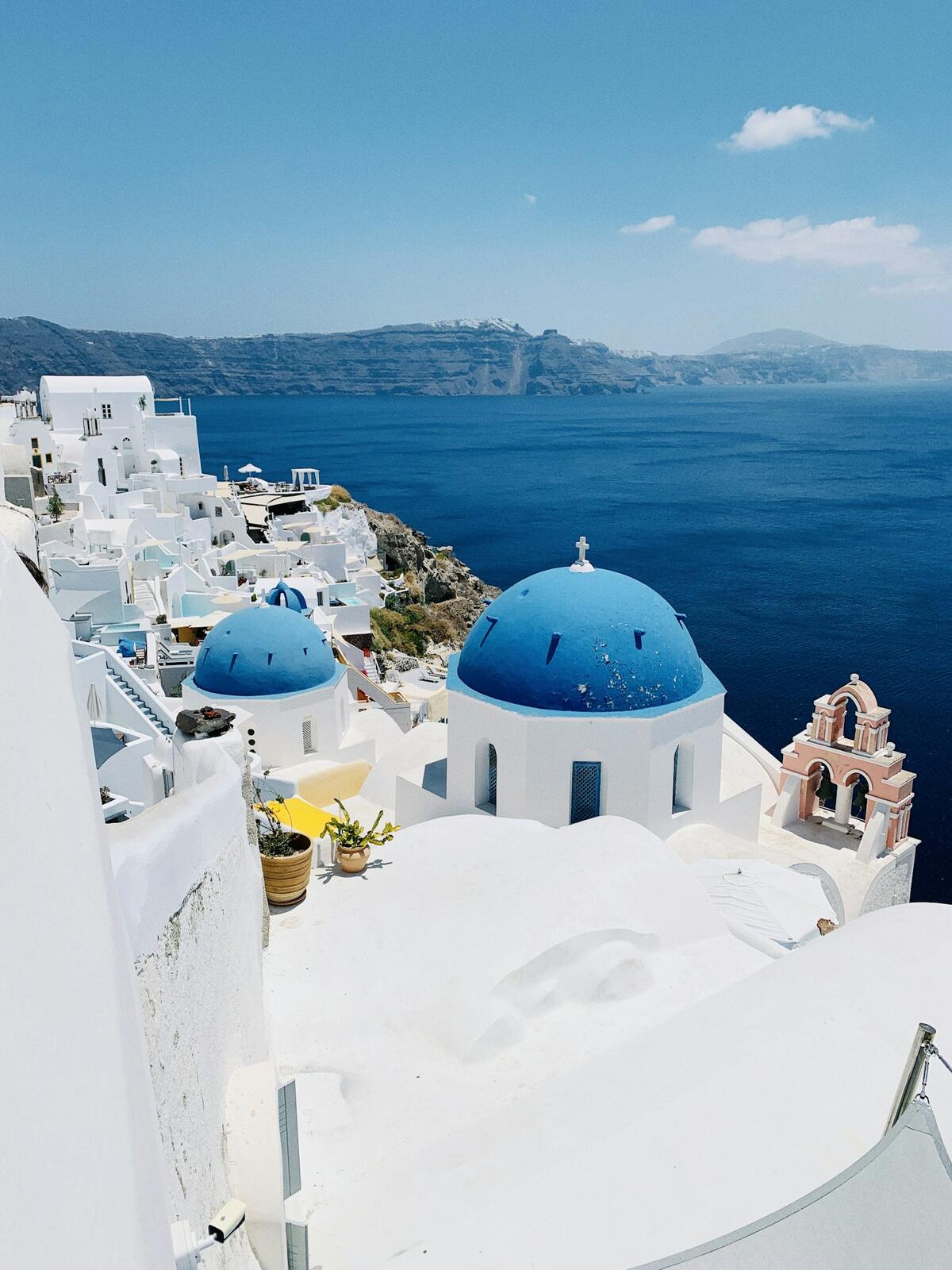Blue dome above the sea in Santorini