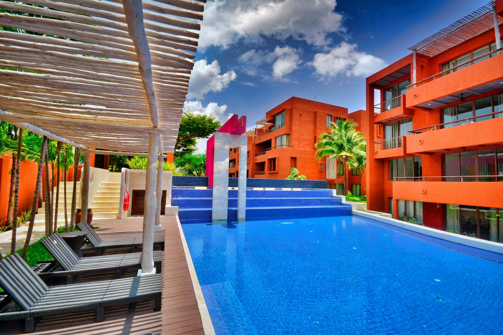 A pool in a resort — illustrative property style — illustrative style for Chao Phraya House
