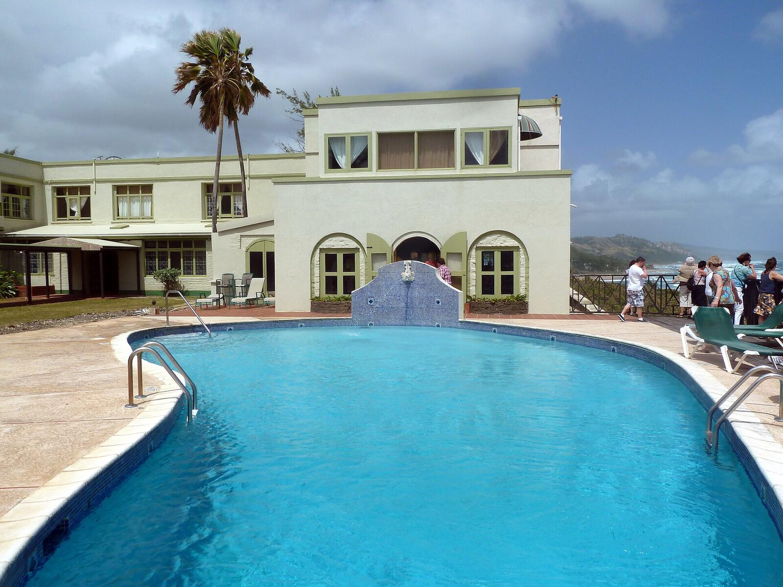 Illustrative accommodation photography for a fictional barbados stay — illustrative style for Atlantic Breeze Villas