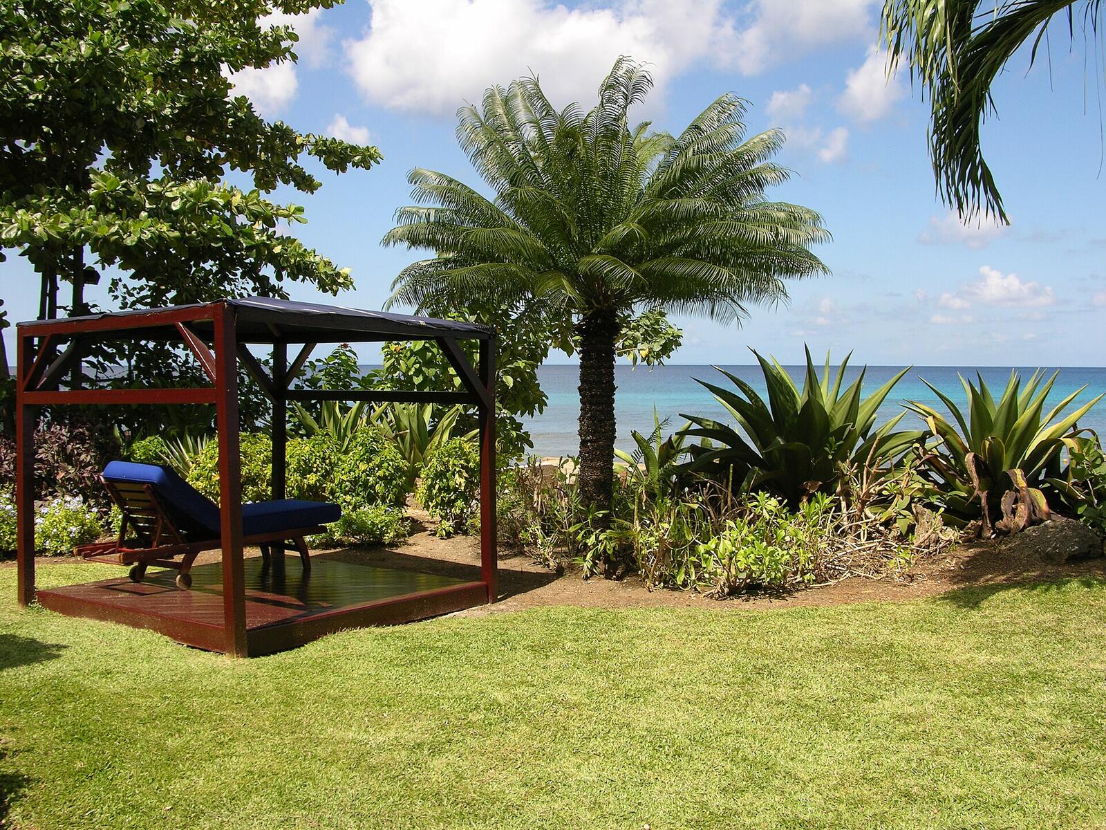 Illustrative accommodation photography for a fictional barbados stay — illustrative style for Coconut Walk Retreat