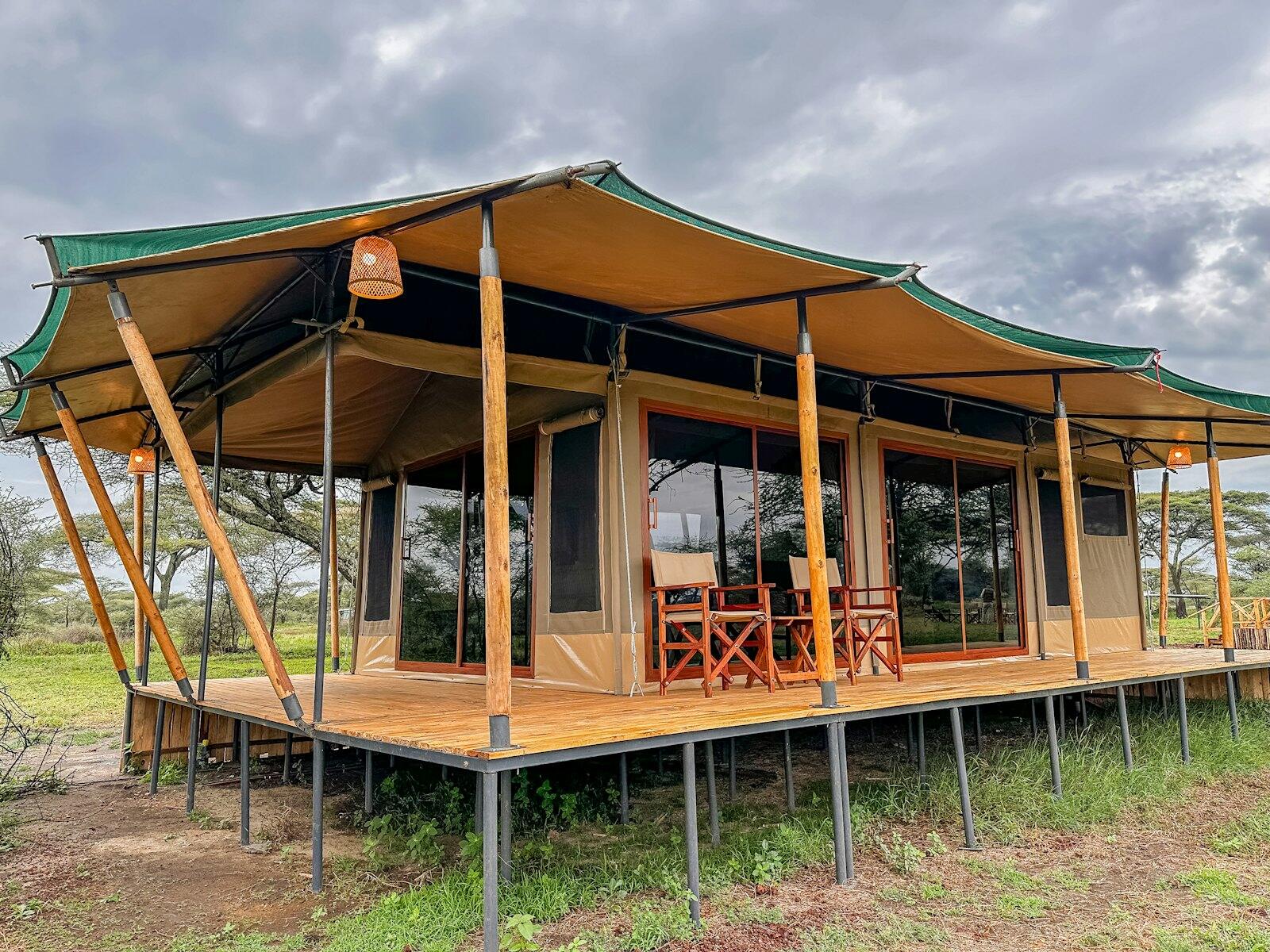 Safari tent with veranda — illustrative property style — illustrative style for Mara Acacia Camp