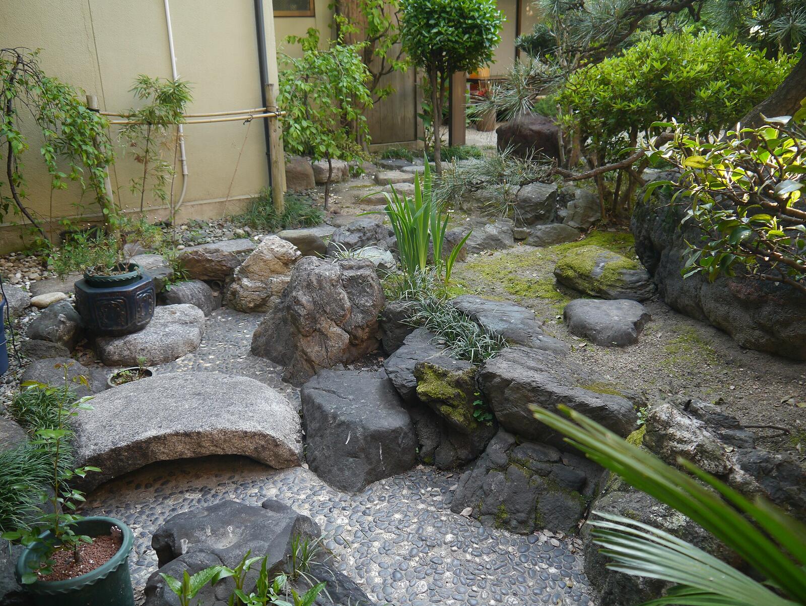 Illustrative accommodation photography for a fictional japan stay — illustrative style for Hiroshima Garden Hotel