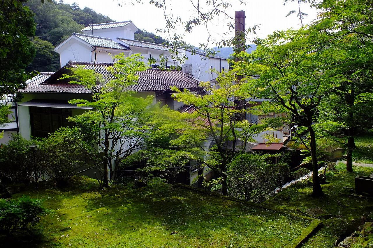 Illustrative accommodation photography for a fictional japan stay — illustrative style for Kumano Trail Lodge